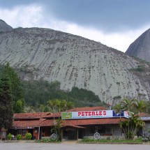 Restaurant with German name and dramatic rock Pedra Azul seen from the Northeast (1822 meters sea-level)